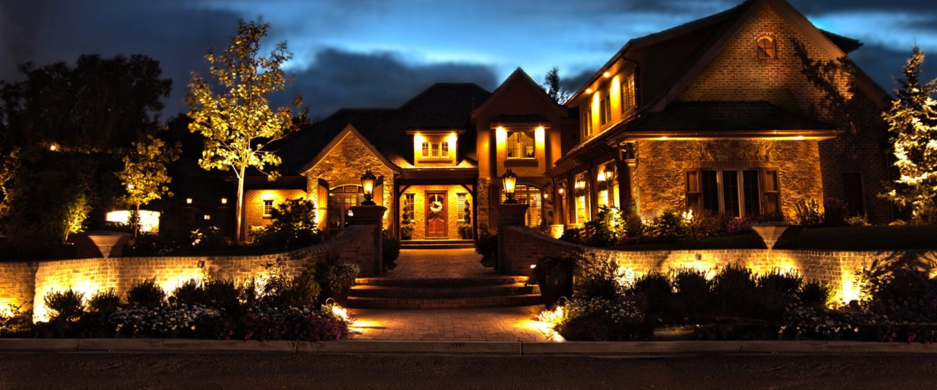 Why Homeowners With Outdoor Lighting Need Soft Washing More Often